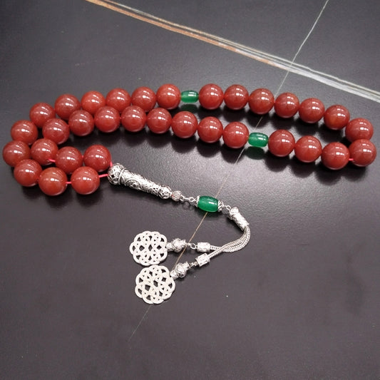 سبحة فخمة عقيق احمر حجم كبير مع حجر عقيق اخضر