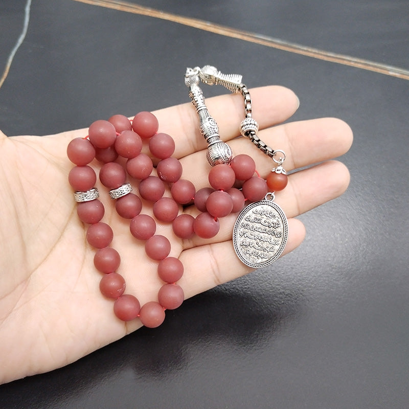 سبحة عقيق احمر مطفي مع الاكسسوار العربي