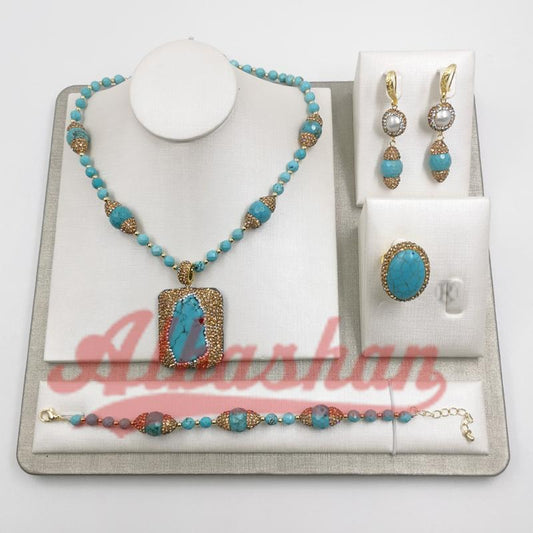 طقم مجوهرات سوار و قلادة و خاتم نسائيه بالحجر الكريم فيروز طبيعي