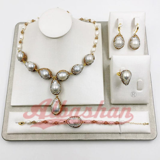 طقم مجوهرات سوار و قلادة و خاتم نسائيه باللولو الابيض طبيعي