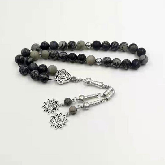 سبحة حجر زيبرا اسود مع اكسسوار اسلامية مميزه - Albashan