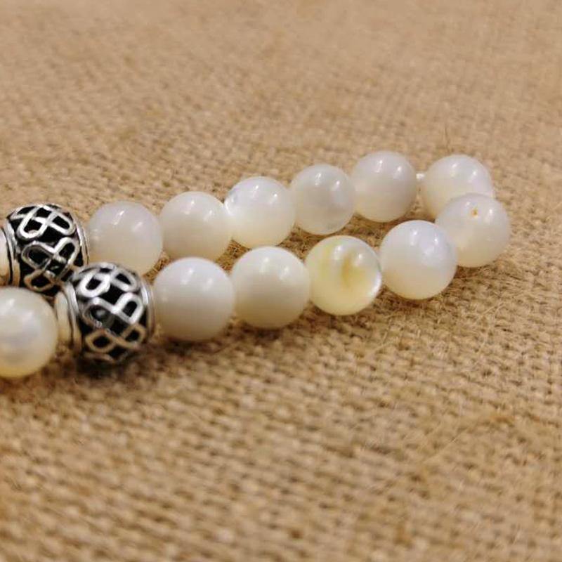 سبحة صدف بحري اصفر بيضاء طبيعية - Albashan