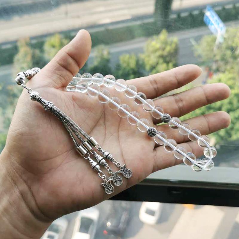 سبحة كريستال أبيض مع شرابة معدنية