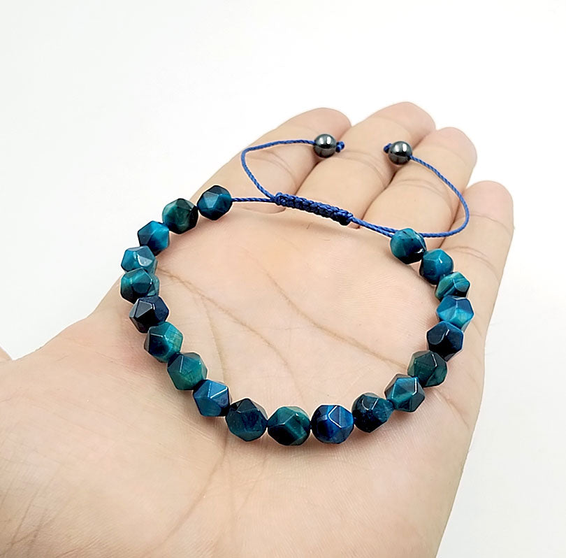 اساور حجر عين النمر ازرق الشكله معين