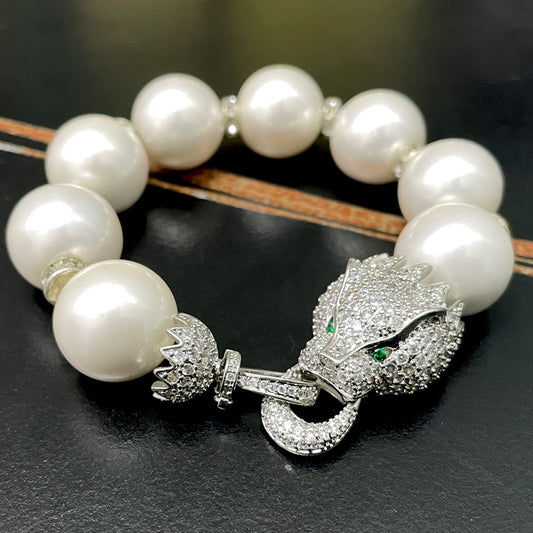 سوار فخمه صدف بحري ابيض حجم كبير مع الاكسسوار موضة راس النمر