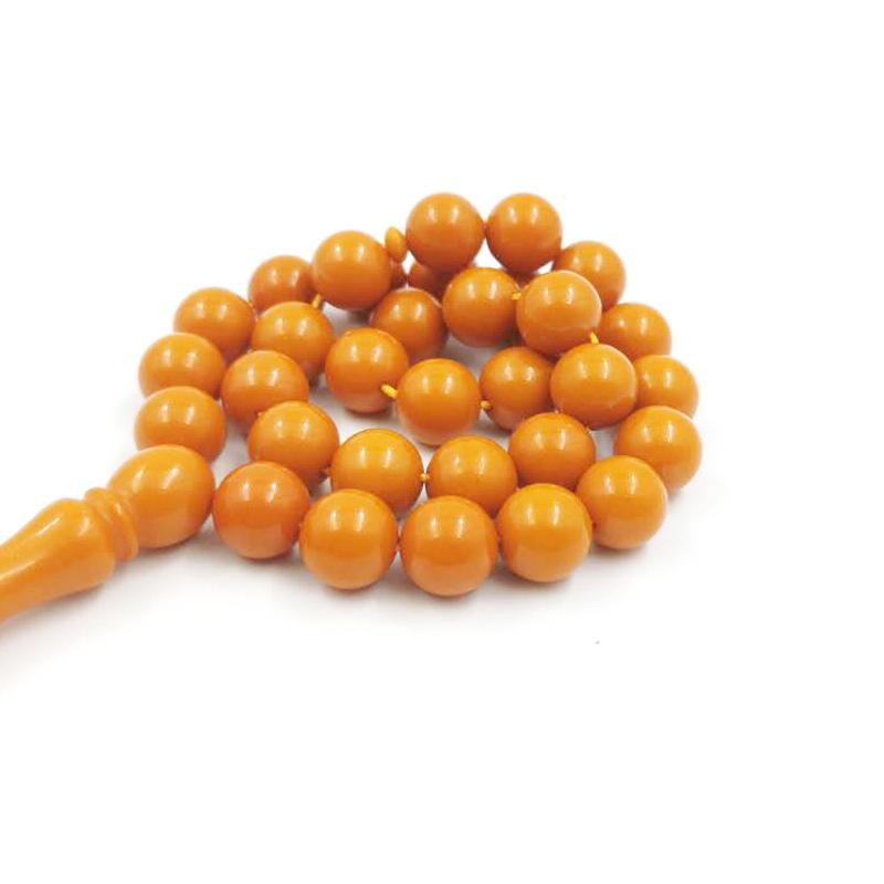 سبحة مستكة لون برتقال لها ريحه