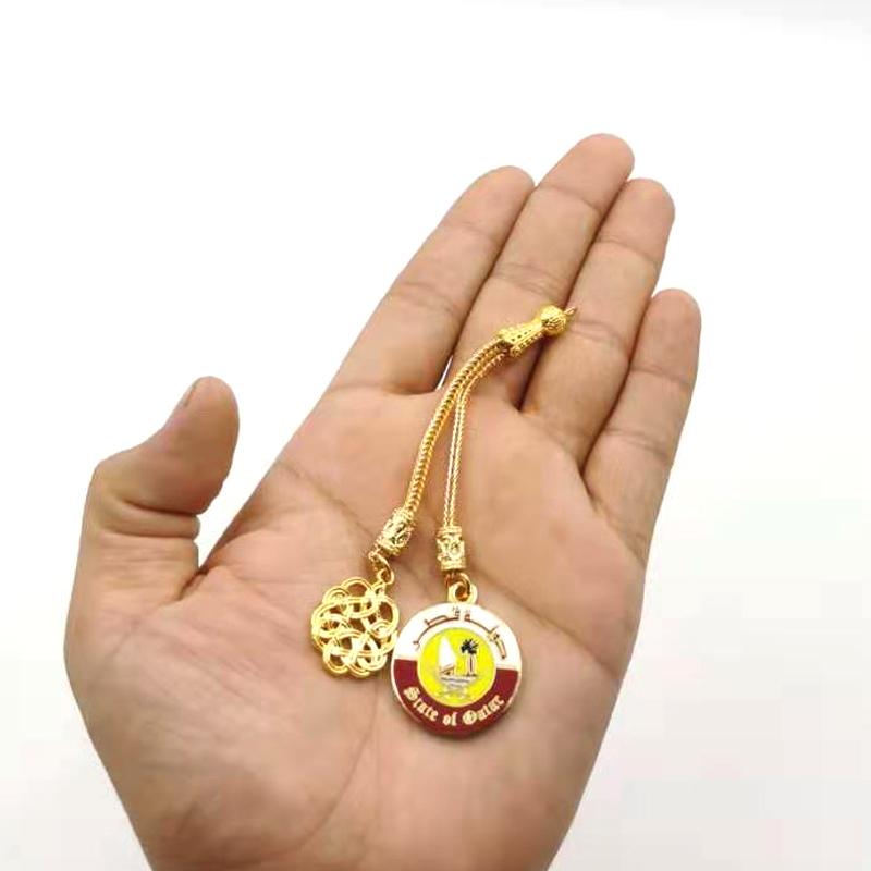 شرابة سبحة ذهبية شعار قطر
