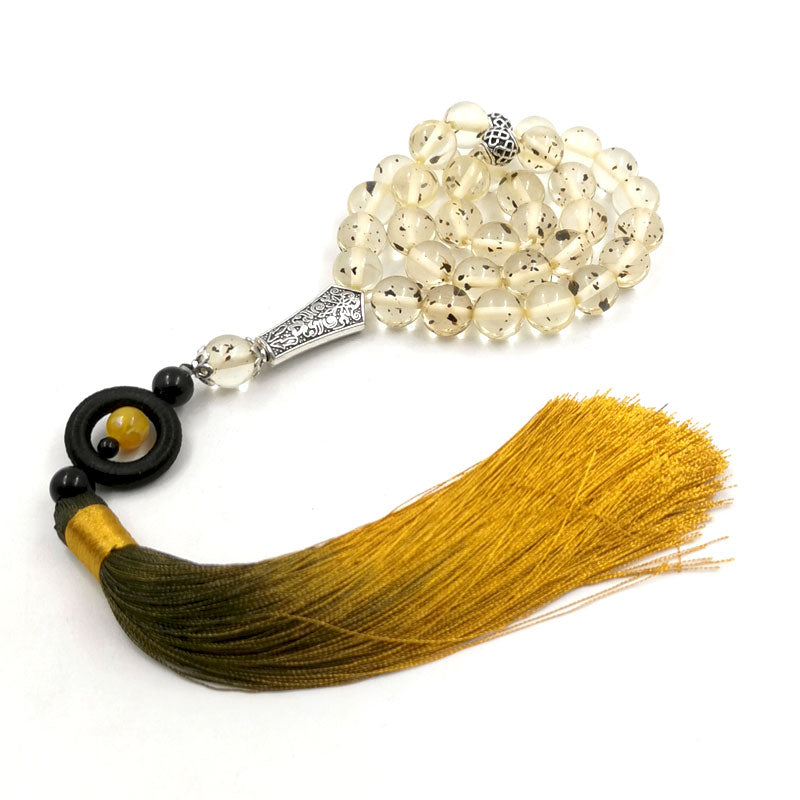 مسبحة مستكة مع شرابة قطن اصفر