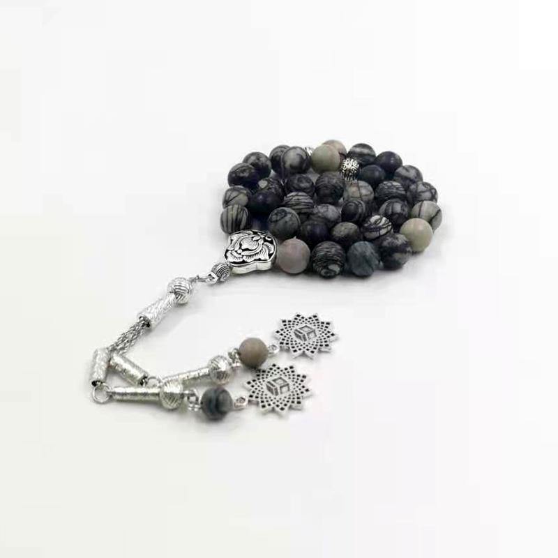 سبحة حجر زيبرا اسود مع اكسسوار اسلامية مميزه - Albashan