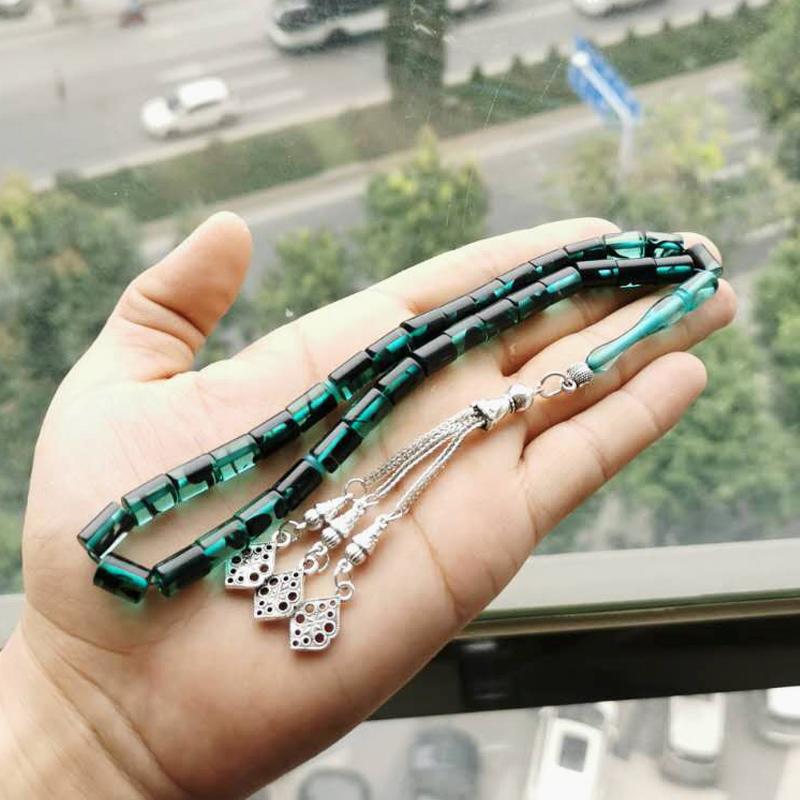 سبحة رجاليه مستكة ازرق مع شرابة معدنية