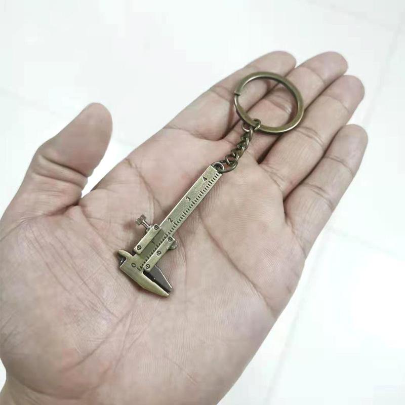 ميدالية مسطرة صغيرة ذهبي و فضي - Albashan