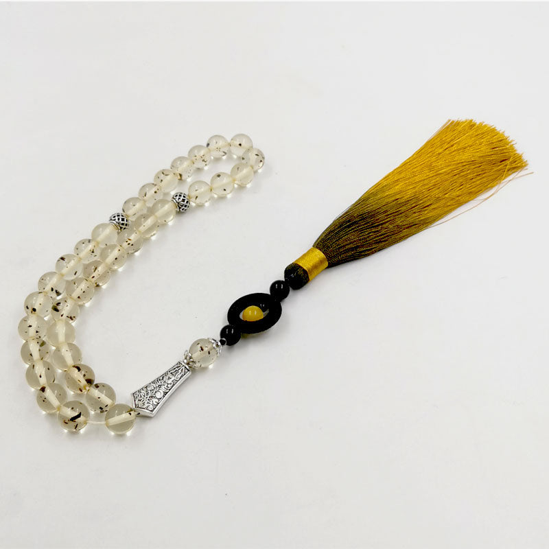 مسبحة مستكة مع شرابة قطن اصفر