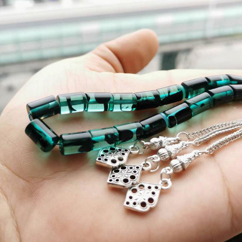 سبحة رجاليه مستكة ازرق مع شرابة معدنية