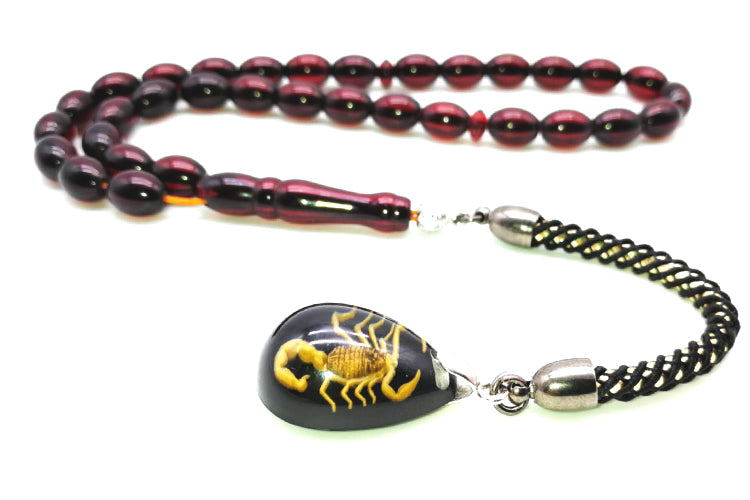 سبحة باكلايت حمراء مع الاكسسوار عقرب حقيقي