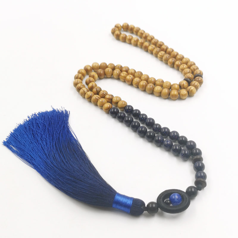 سبحة 99/100 خرز من خشب الزان مع حجر نجومي ازرق طبيعي