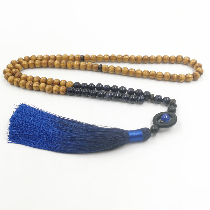 سبحة 99/100 خرز من خشب الزان مع حجر نجومي ازرق طبيعي