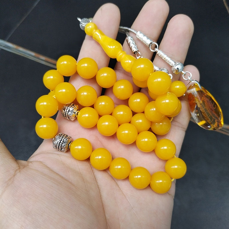 سبحة مستكة اصفر مع عقرب حقيقي
