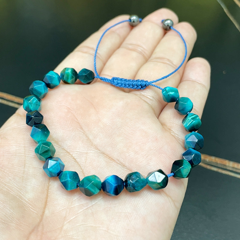 اساور حجر عين النمر ازرق الشكله معين