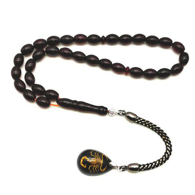 سبحة باكلايت حمراء مع الاكسسوار عقرب حقيقي