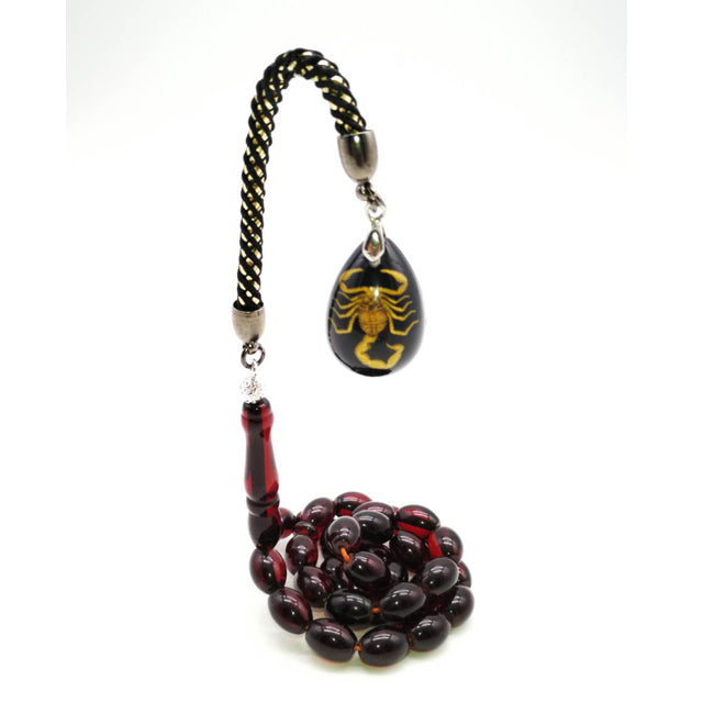 سبحة باكلايت حمراء مع الاكسسوار عقرب حقيقي