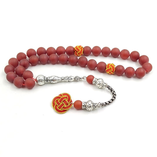 سبحة عقيق احمر مطفي مع طربزونة قطن يدويه