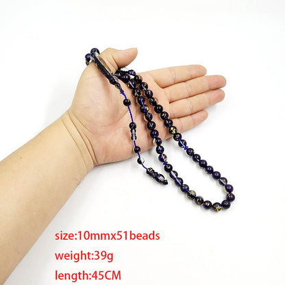 سبحة جديدة باكلايت ازرق داخلها ورق الذهب