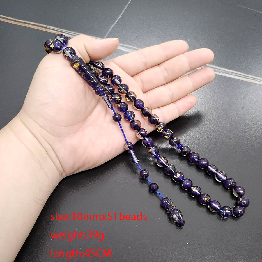 سبحة جديدة باكلايت ازرق داخلها ورق الذهب