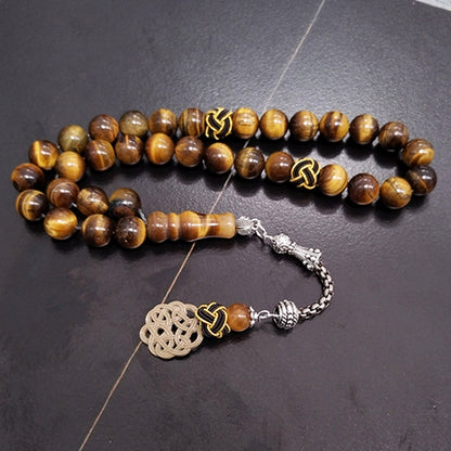 سبحة حجر عين النمر اصفر طبيعي مع طربزونة يدويه