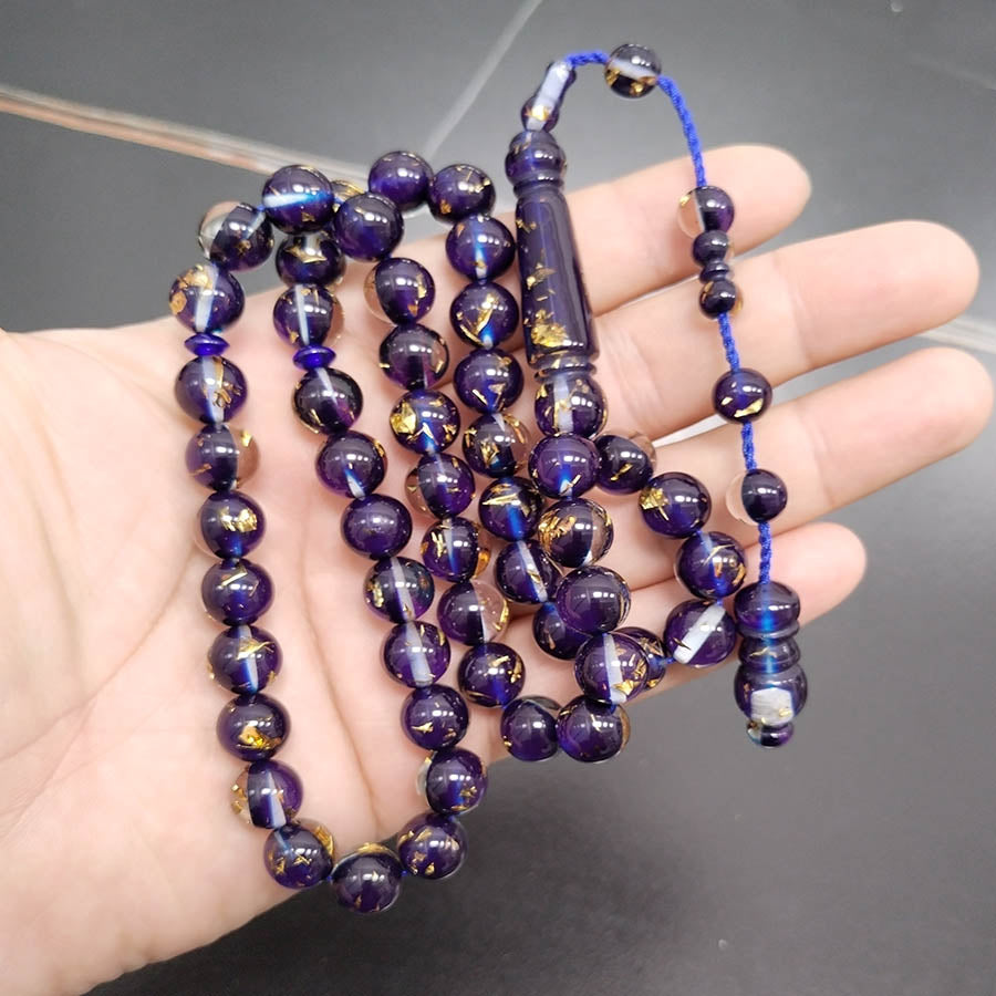 سبحة جديدة باكلايت ازرق داخلها ورق الذهب