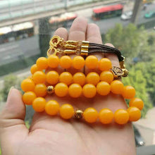 سبحة مستكة برتقالي مع الاكسسوار ذهبي مميزه - Albashan تحميل الصورة في عارض المعرض
