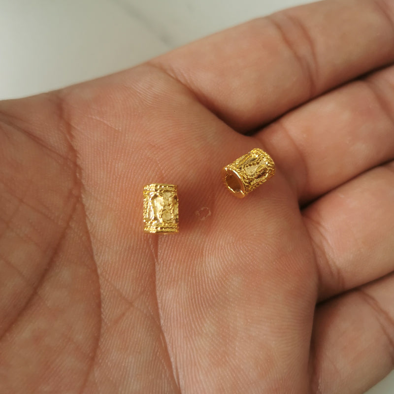 اكسسوار خرز معدني ذهبي الشكل الاسطواني