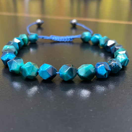 اساور حجر عين النمر ازرق الشكله معين